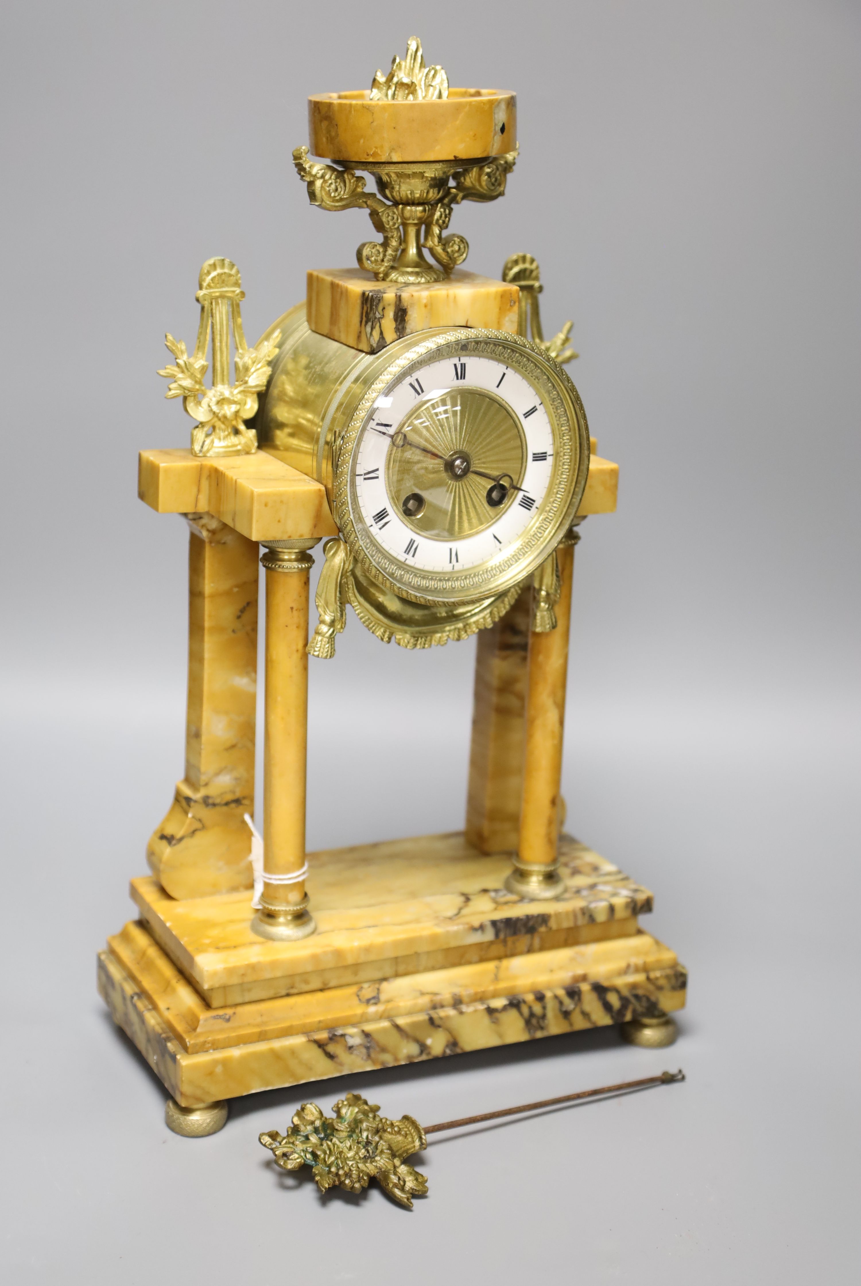 A French gilt metal and marble mantel clock, height 43cm